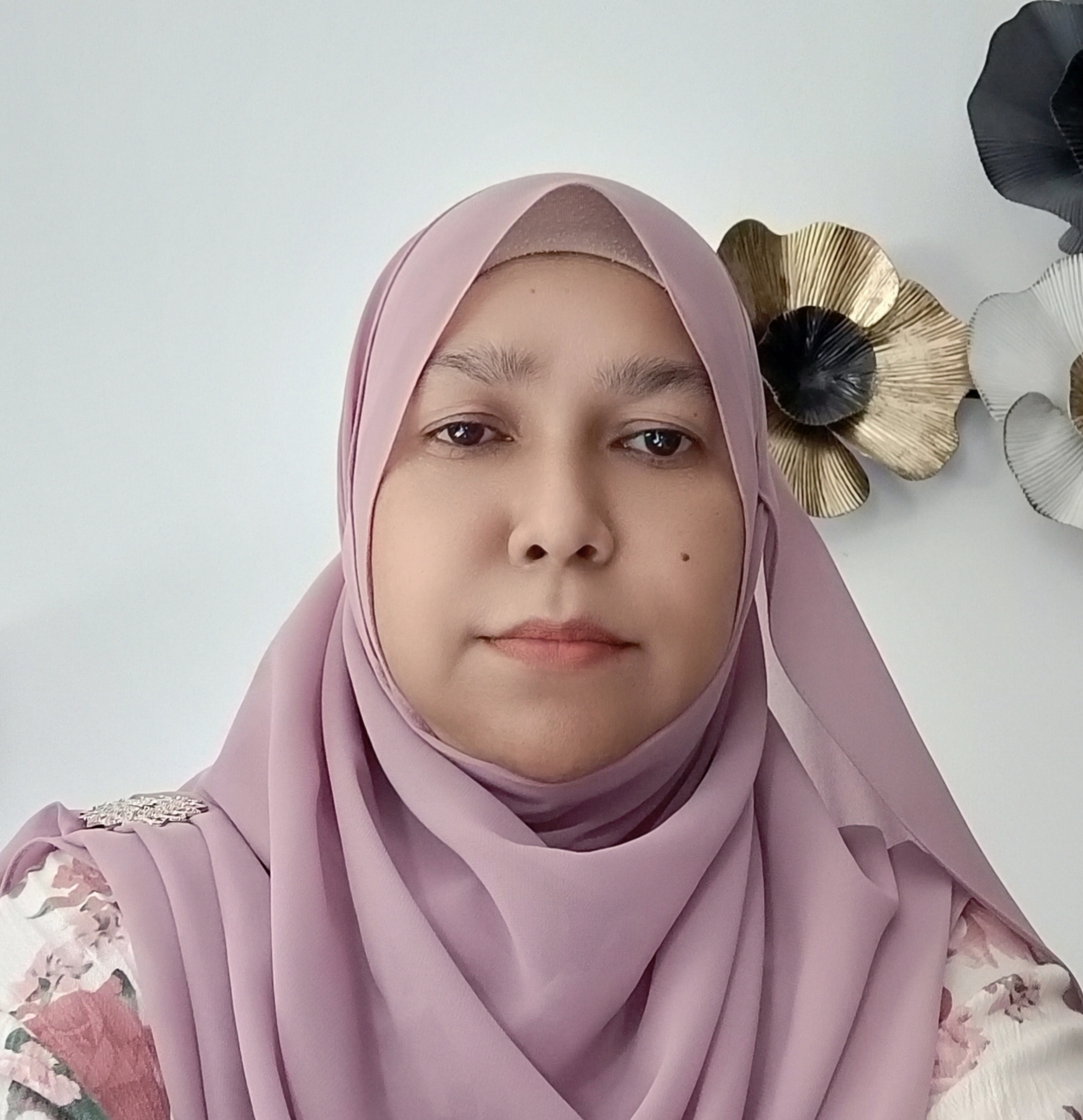 Ms Zaiton Yusof